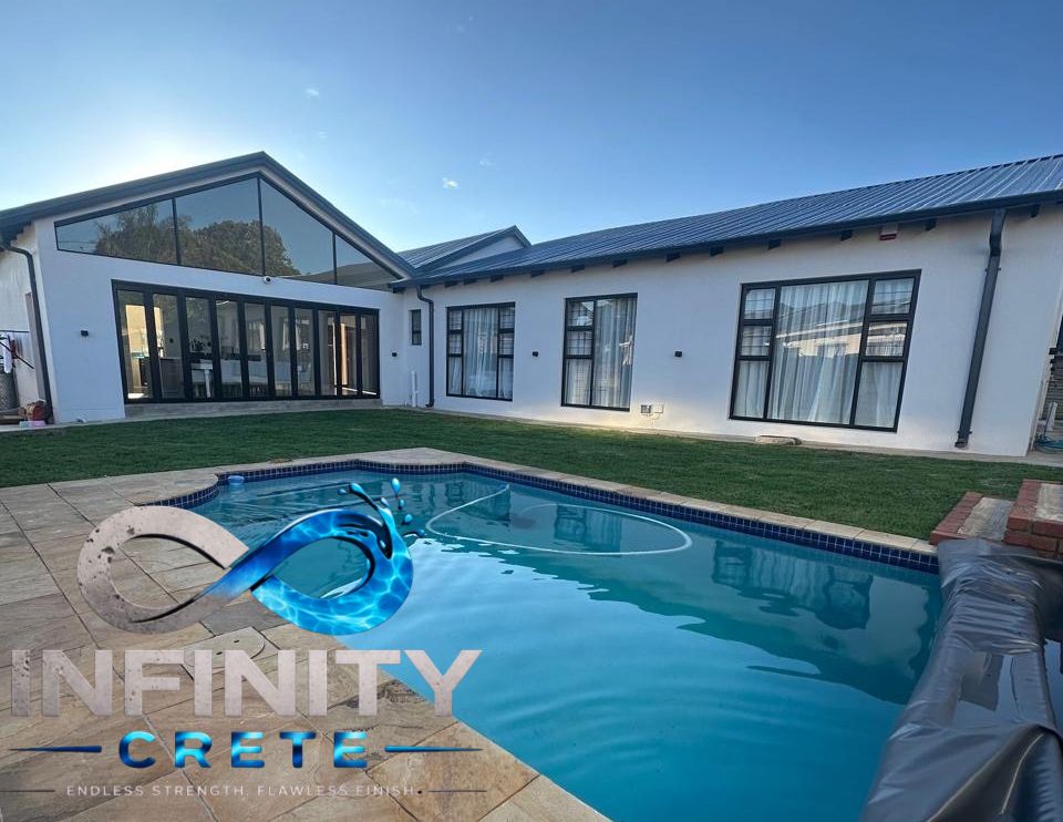 After — deep blue Marblelite pool resurfacing finish by Infinity Crete with 10-year watertight guarantee