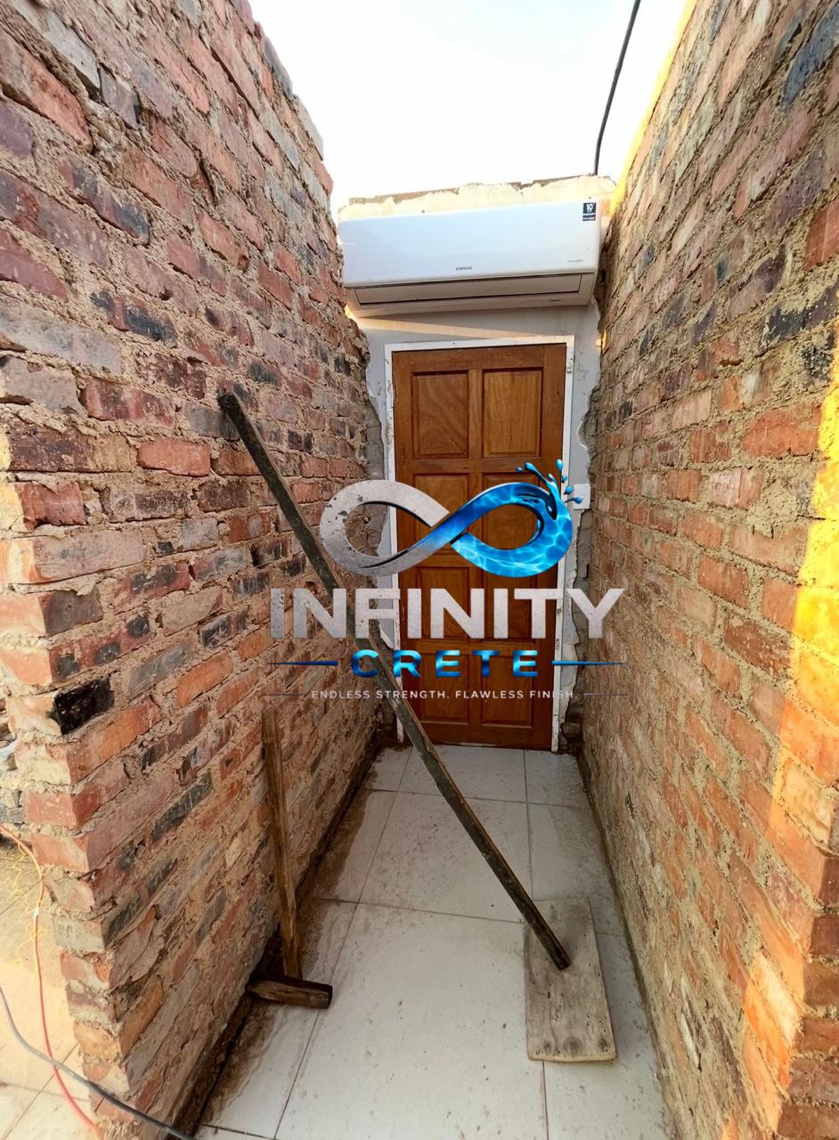 Before — residential entrance hall and passage prior to screed flooring upgrade